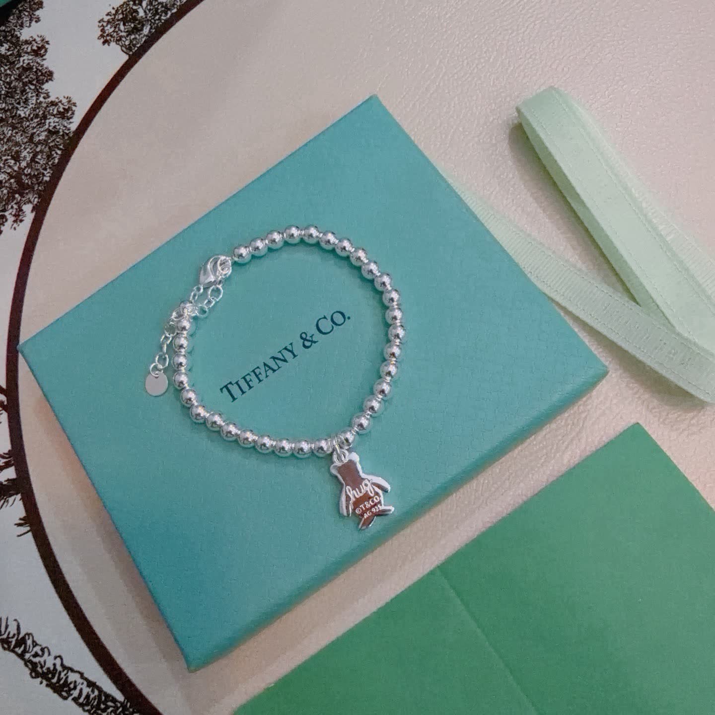 Tiffany & Co. Sterling Silver Beaded Bracelet with Huggy Bear Charm